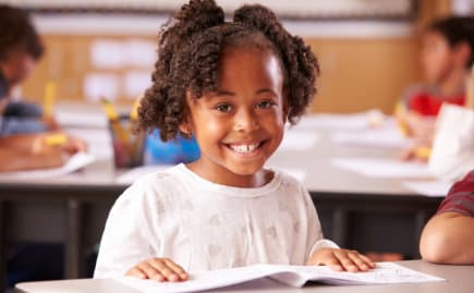 African American elementary school girl in class